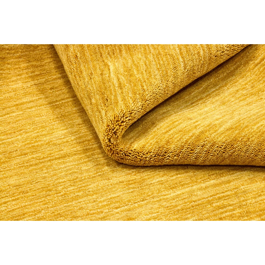 Aranysárga prémium gyapjú szőnyeg Panorama Uni 240 x 170 cm